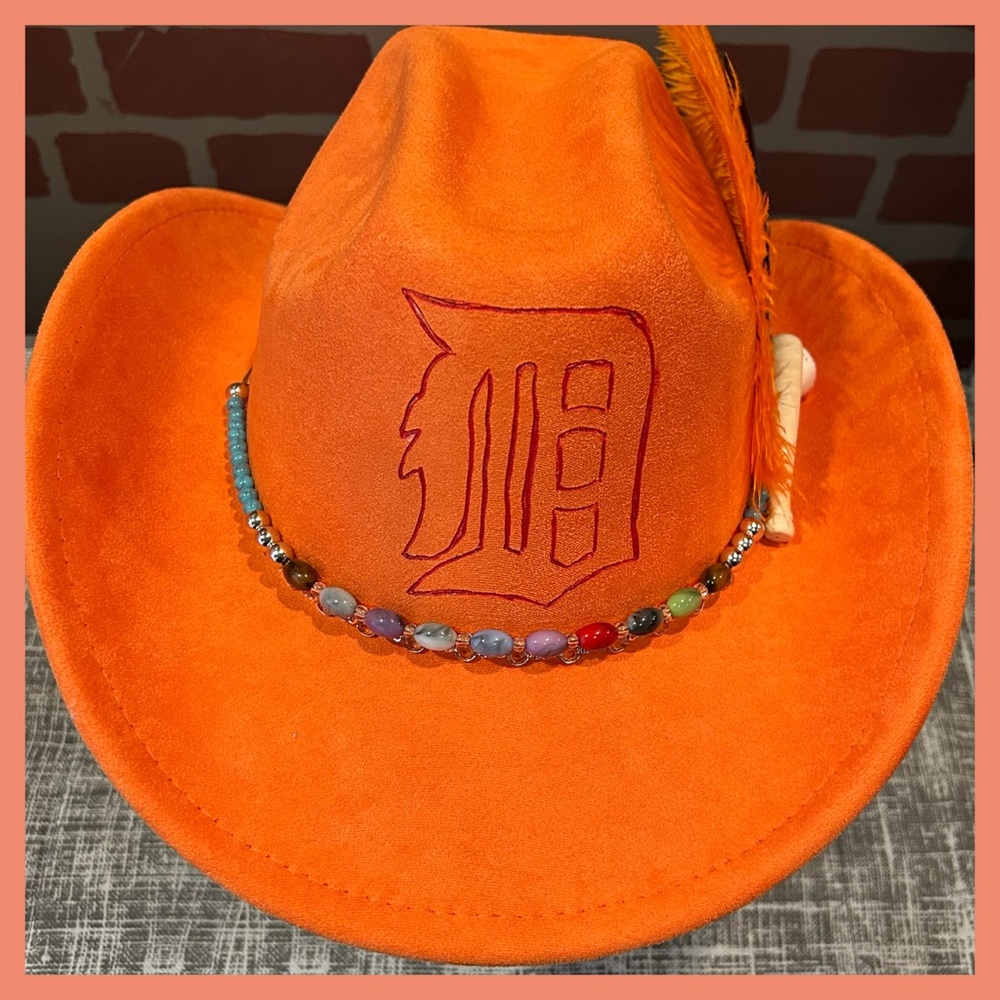 Vibrant Orange Burnt Detroit Cowboy Hat with Beaded Band and ostrich feathers